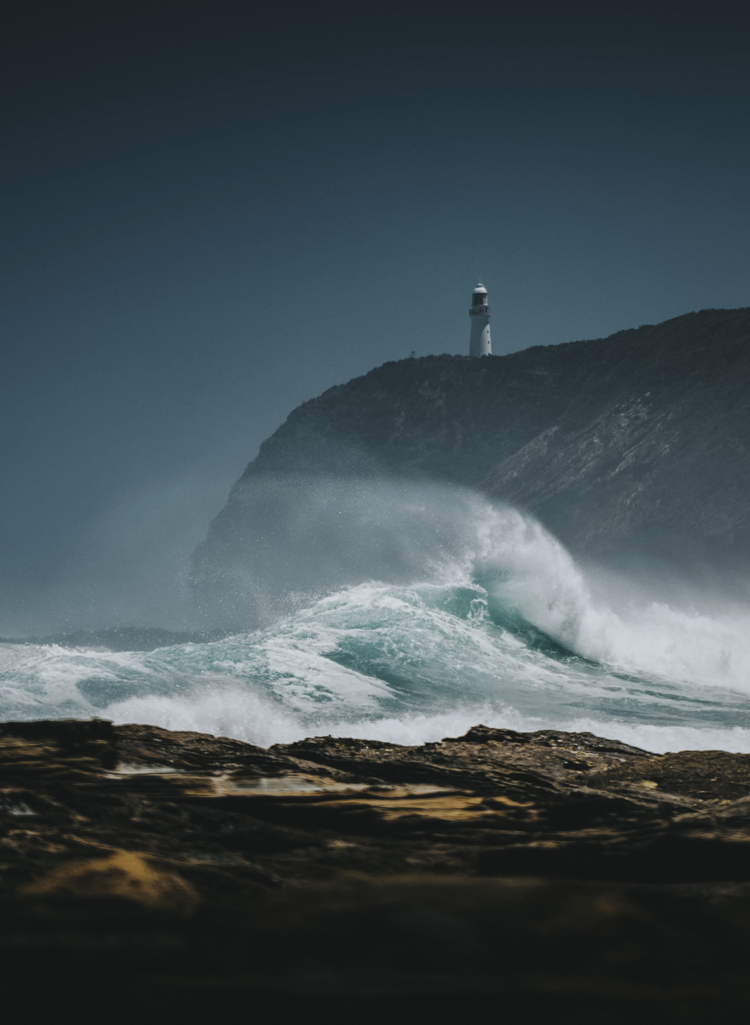 Cape Egmont Lighthouse with Mt Taranaki in the distance